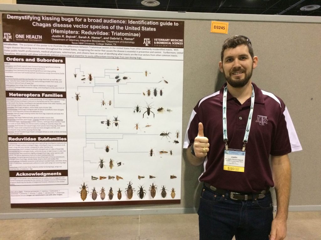 Just Bejcek poses with his research poster at an entomology conference