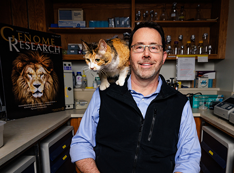 Dr. William Murphy with Lexi the cat